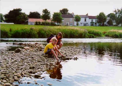 Ali and Tom by the river